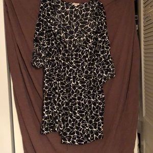 3/4 sleeved romper with a sinching waist